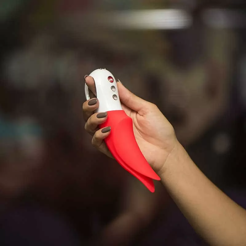 Универсальный вибратор Fun Factory Volta со стимулирующими лепестками, 12 режимов, с функцией блокировки, оранжевый