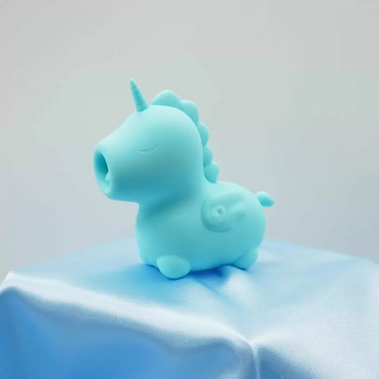 Стимулятор клитора с язычком Unihorn Mount'n Peak, голубой