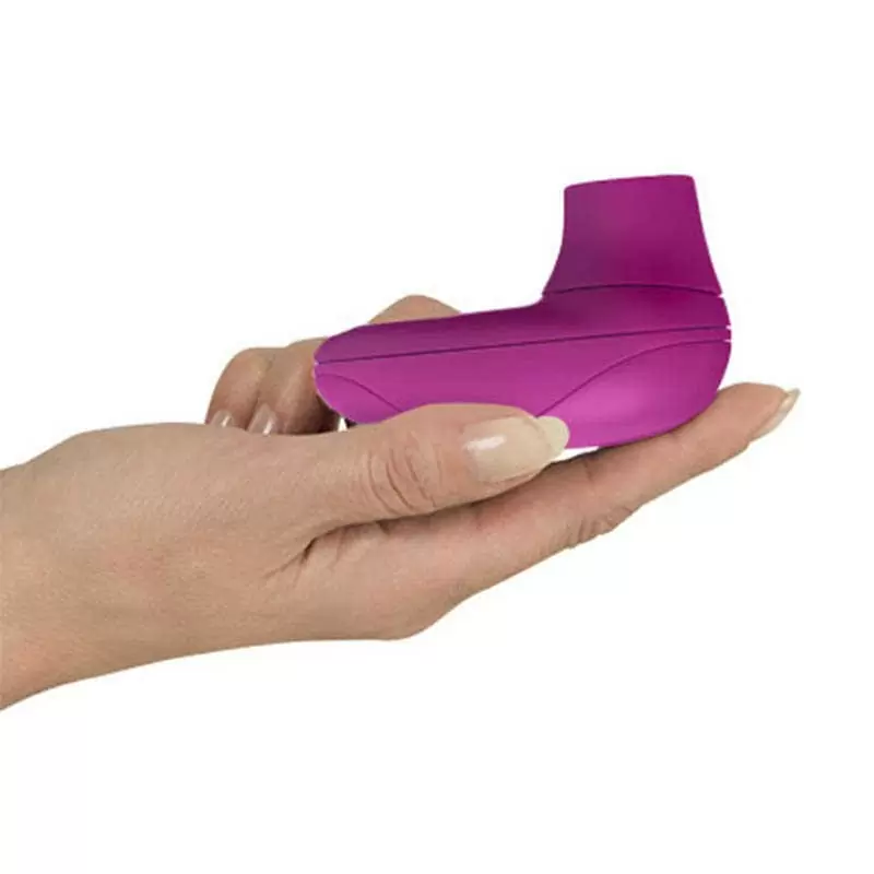 Миниатюрный вакуумный клиторальный стимулятор Womanizer Starlet – розовый