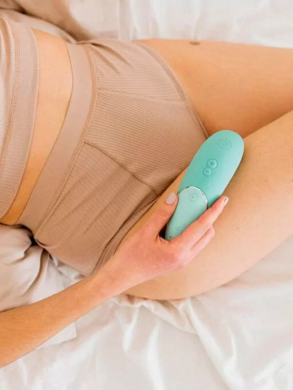 Бесконтактный стимулятор клитора Womanizer Next, технология Pleasure Air, 14 скоростей, зеленый